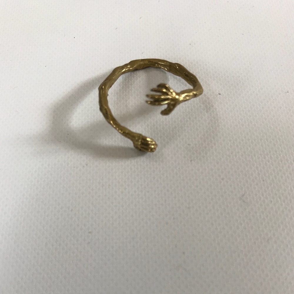 Mystery Hugs adjustable brass ring